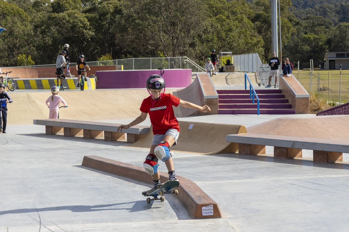 skate park with girl riding skateboard